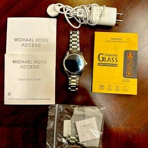 Michael Kors Bradshaw Smartwatch with accessories.
